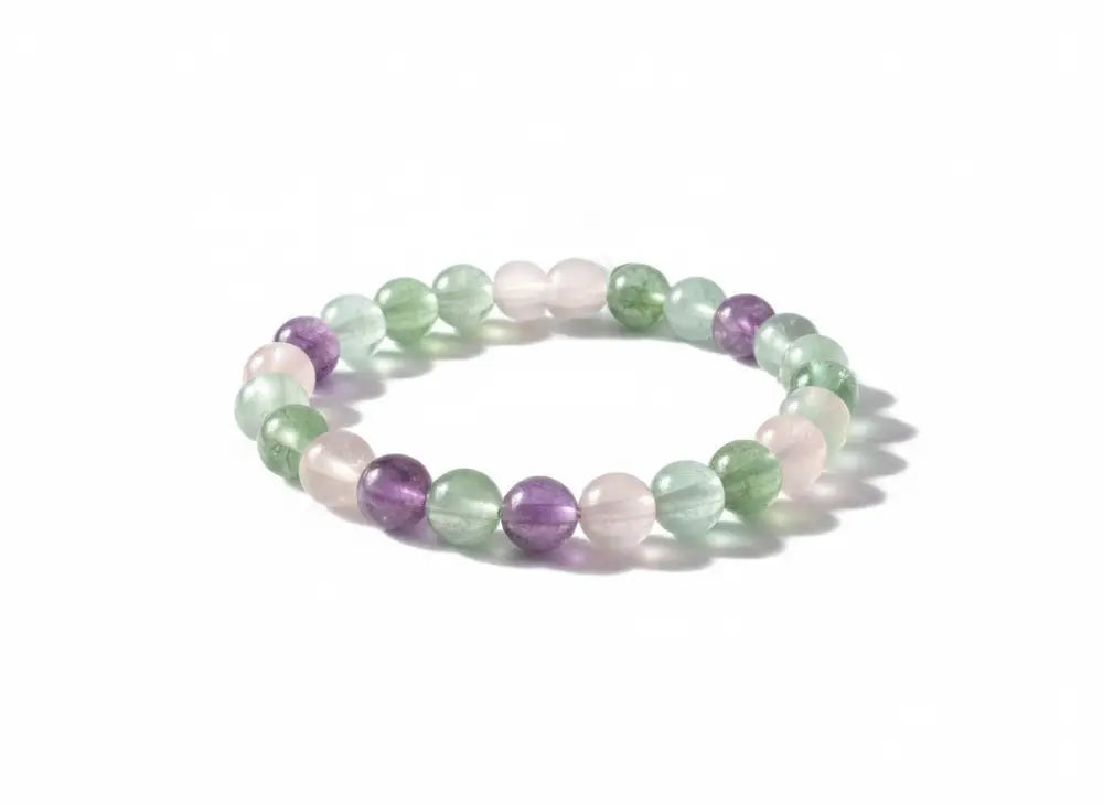 dreampunk.arts Mystic Fluorite beaded bracelet featuring round purple, green, and soft pink natural gemstone beads.