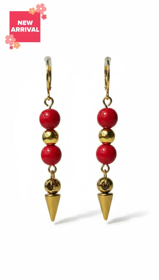 dreampunk.arts Red Roses Spikey earrings featuring red acrylic beads, gold hematite beads, and gold spike pendants.